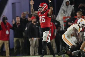 Georgia Bulldogs reenter AP top ten with victory over league rival Tennessee.