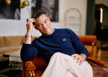 Luke Evans, an unlikely action star, has relived his history to inspire others.