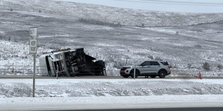 Afternoon chaos on Deerfoot Trail: Overturned truck brings traffic to a halt, disrupting northbound commutes near Airport Trail.